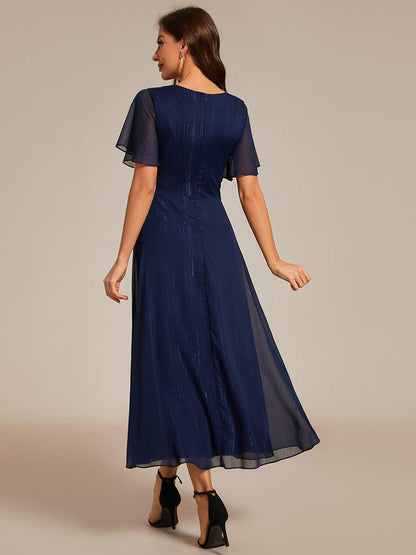 ever OPAHL|Silver Metallic Fabric V-Neck A-Line Evening Dress Featuring Delicate Ruffled Hem