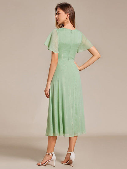 ever OPAHL|Silver Metallic Fabric V-Neck A-Line Wedding Guest Dress Featuring Delicate Ruffled Hem