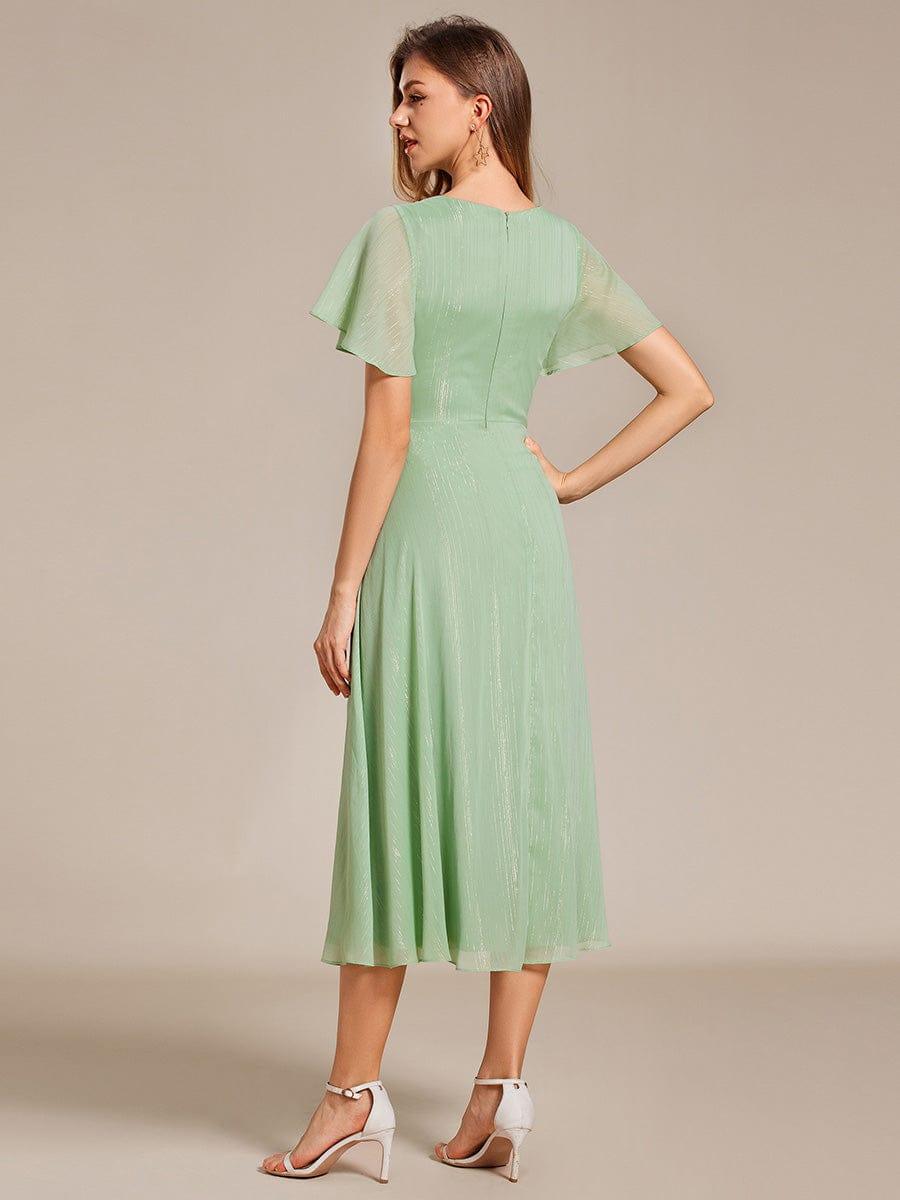 ever OPAHL|Silver Metallic Fabric V-Neck A-Line Evening Dress Featuring Delicate Ruffled Hem