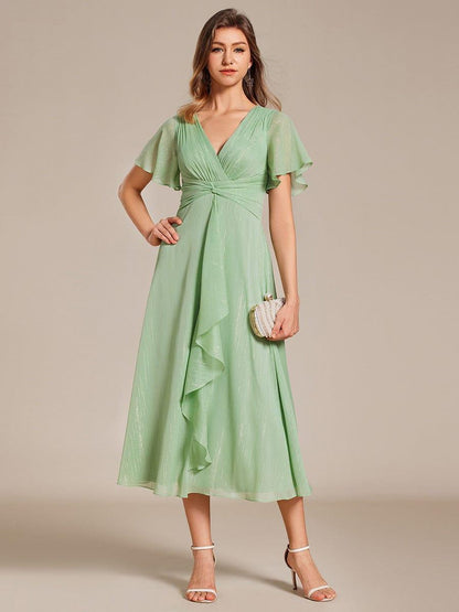 ever OPAHL|Silver Metallic Fabric V-Neck A-Line Evening Dress Featuring Delicate Ruffled Hem