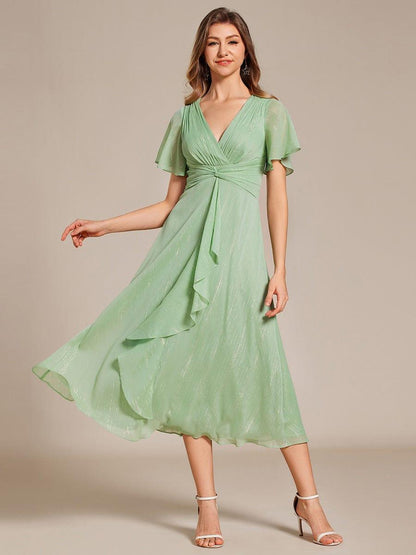 ever OPAHL|Silver Metallic Fabric V-Neck A-Line Evening Dress Featuring Delicate Ruffled Hem